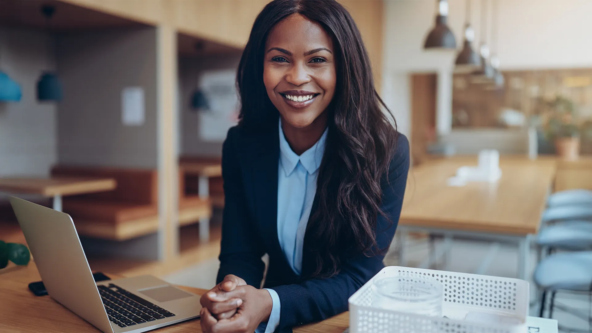 Professional Business women with laptop open posing for a photo